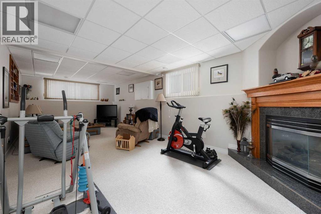 Family rm View#2 - 237 Trillium Road, Fort Mcmurray, AB - Indoor With Fireplace