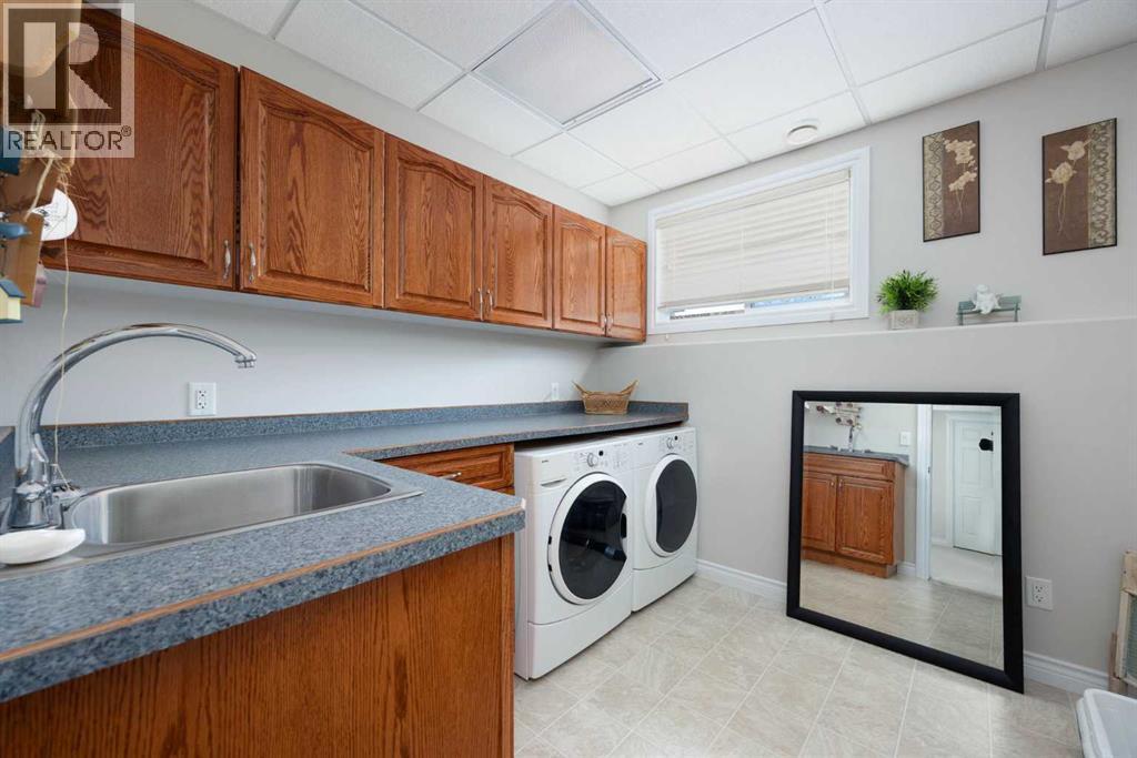 Spacious Laundry room - 237 Trillium Road, Fort Mcmurray, AB - Indoor Photo Showing Laundry Room