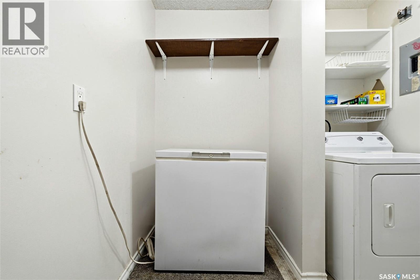 A 64 Nollet Avenue, Regina, SK - Indoor Photo Showing Laundry Room