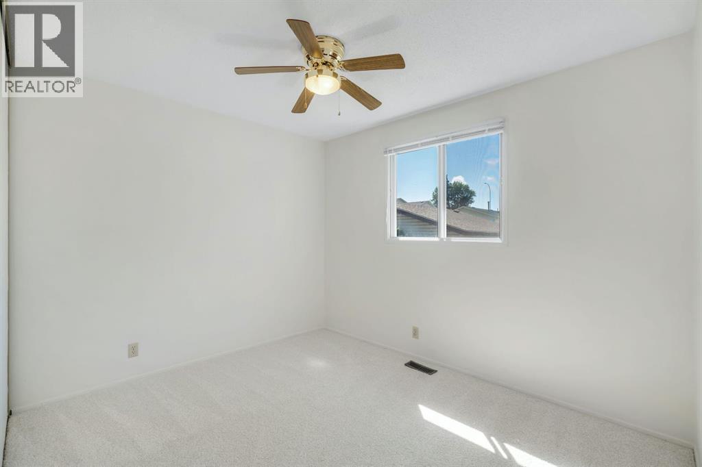 127 Falshire Way Ne, Calgary, AB - Indoor Photo Showing Other Room