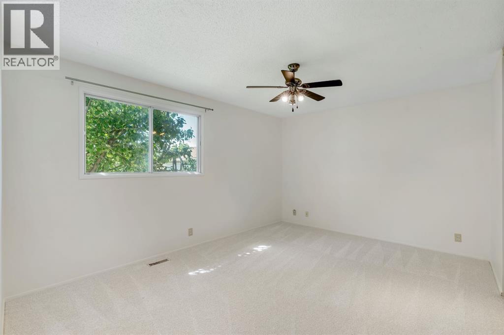 127 Falshire Way Ne, Calgary, AB - Indoor Photo Showing Other Room