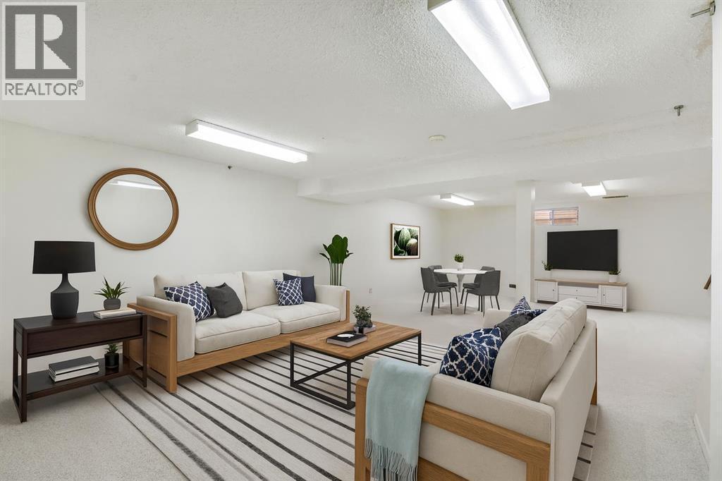 127 Falshire Way Ne, Calgary, AB - Indoor Photo Showing Living Room