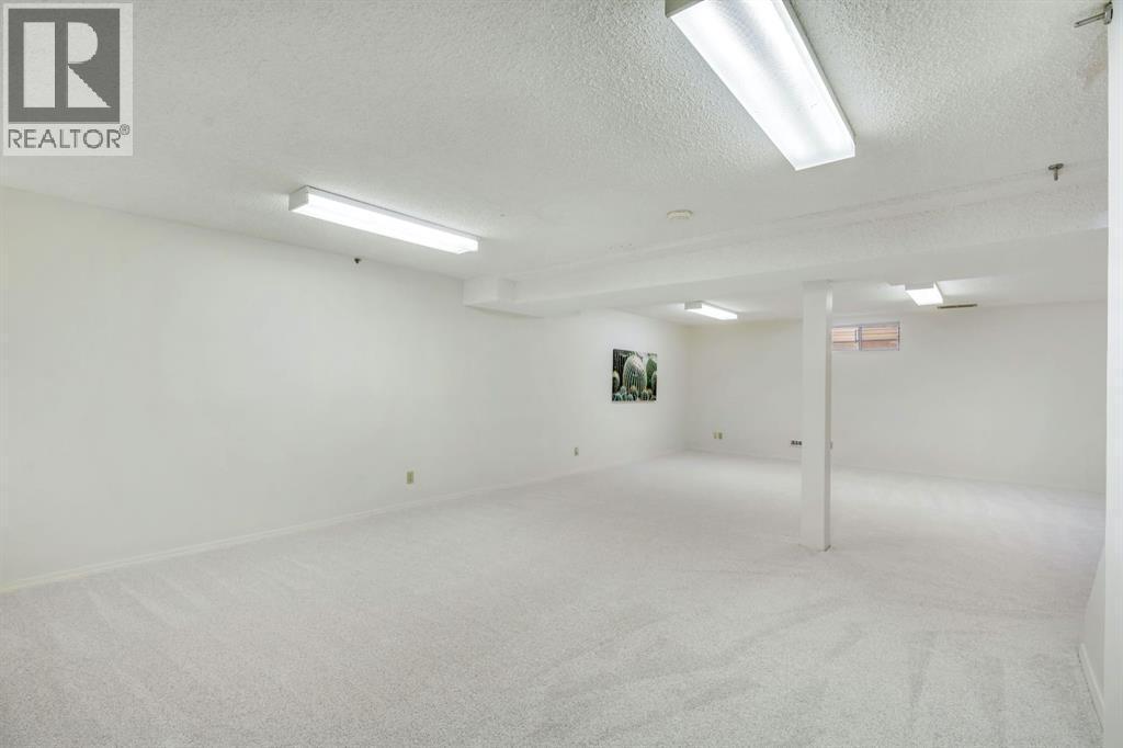 127 Falshire Way Ne, Calgary, AB - Indoor Photo Showing Other Room
