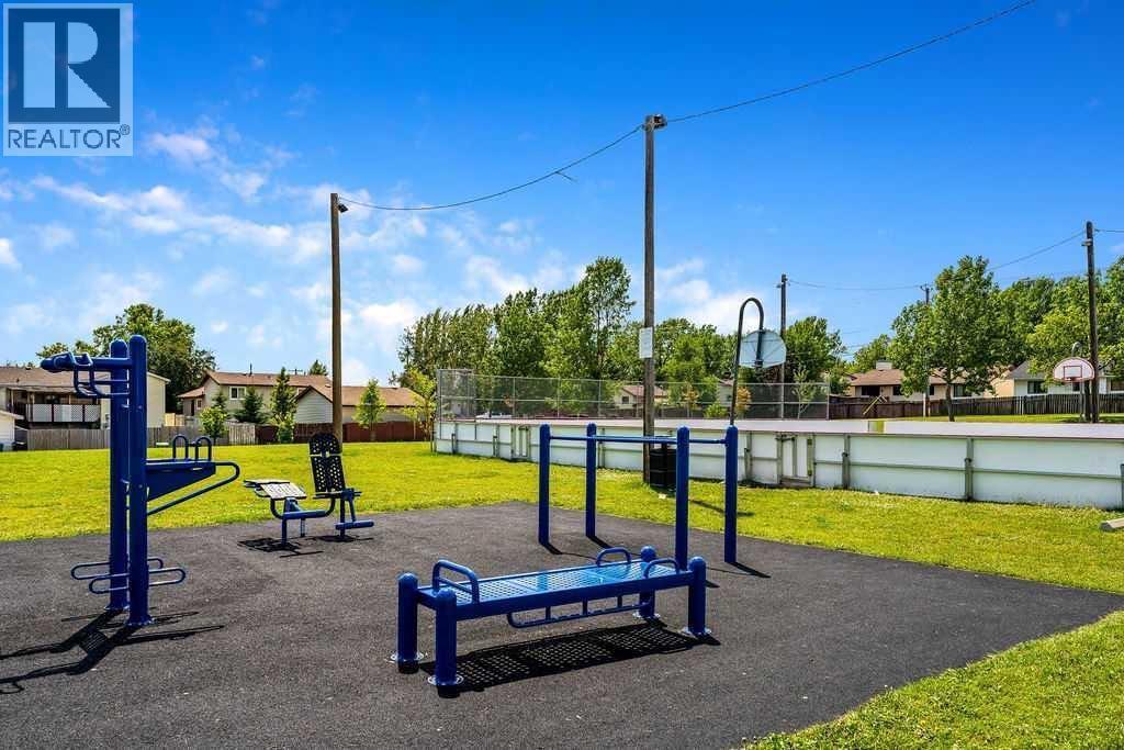 127 Falshire Way Ne, Calgary, AB - Outdoor With Backyard