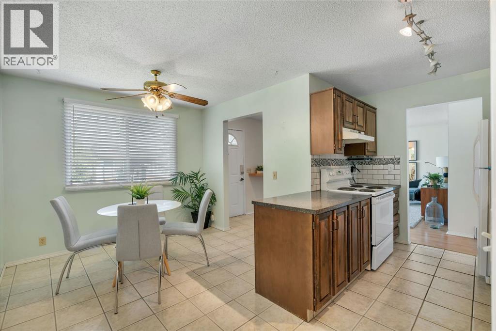 127 Falshire Way Ne, Calgary, AB - Indoor Photo Showing Other Room