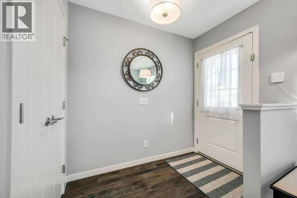 731, 101 Sunset Drive, Cochrane, AB - Indoor Photo Showing Other Room
