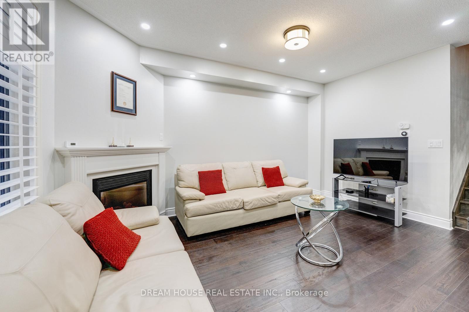353 Michener Place, Milton, ON - Indoor Photo Showing Living Room With Fireplace