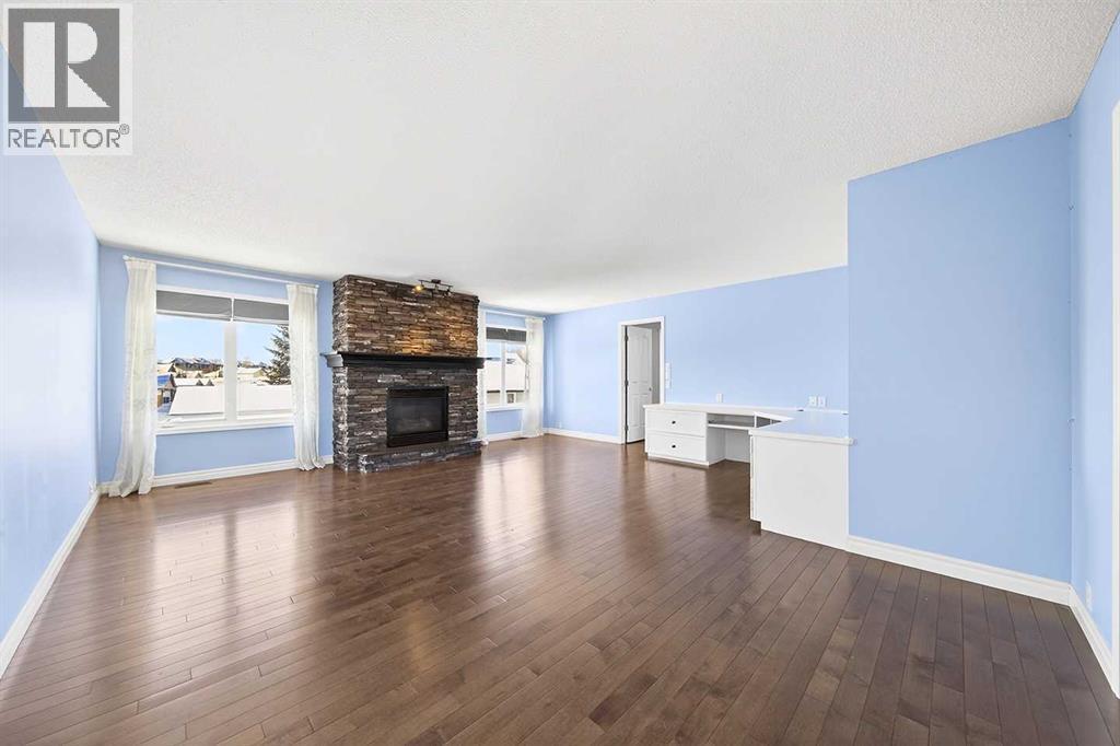 15209 Prestwick Boulevard Se, Calgary, AB - Indoor Photo Showing Living Room With Fireplace