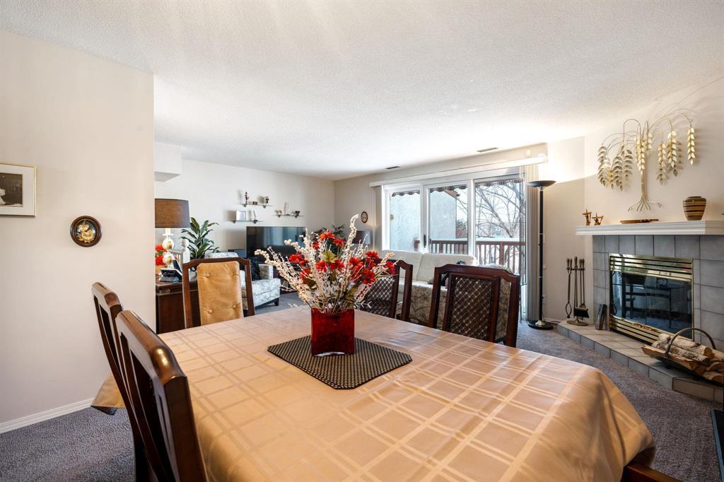 7 191 Hamilton Avenue, Winnipeg, MB - Indoor Photo Showing Dining Room With Fireplace