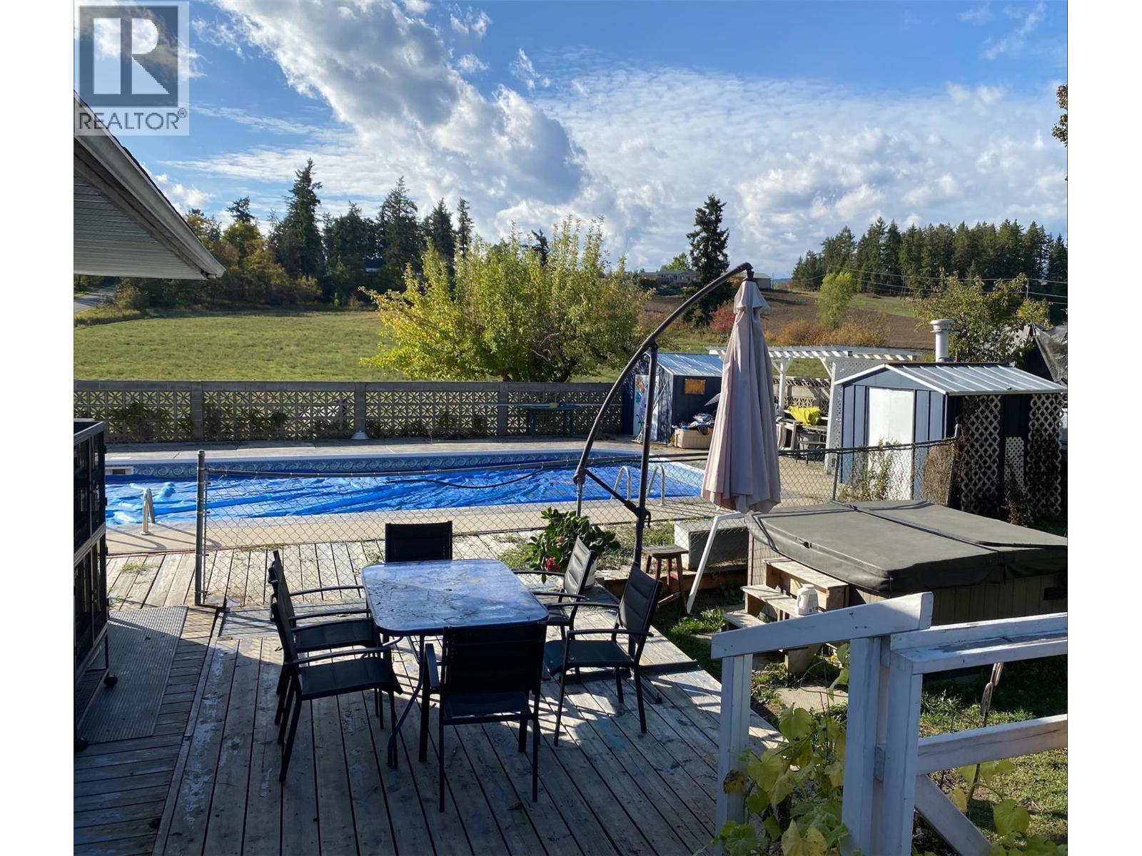 A photo from summer 2025 - 4010 Dodds Road, Armstrong, BC - Outdoor With In Ground Pool