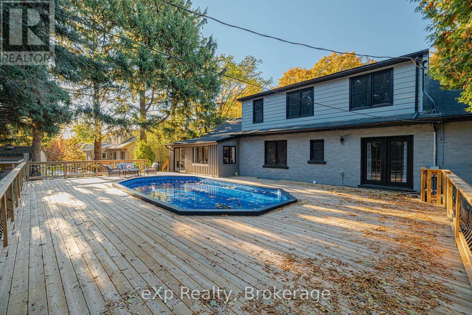 877 Kingsway Drive, Burlington (Lasalle), ON - Outdoor With Above Ground Pool With Deck Patio Veranda