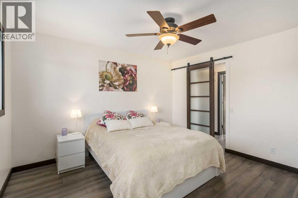 1315 Lake Michigan Crescent Se, Calgary, AB - Indoor Photo Showing Bedroom