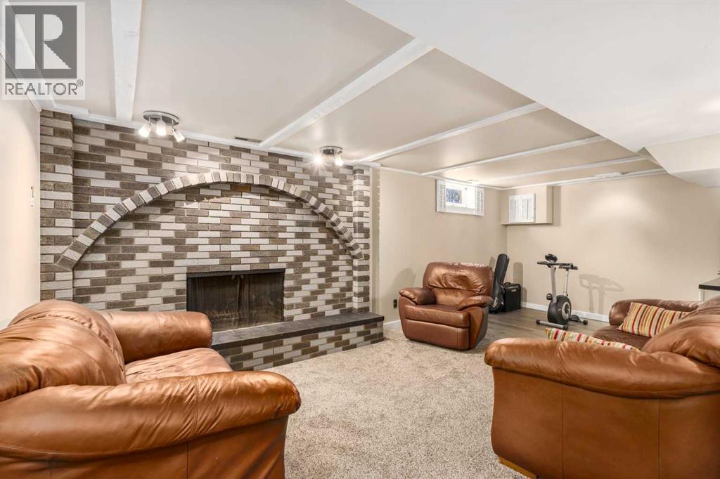 1315 Lake Michigan Crescent Se, Calgary, AB - Indoor With Fireplace