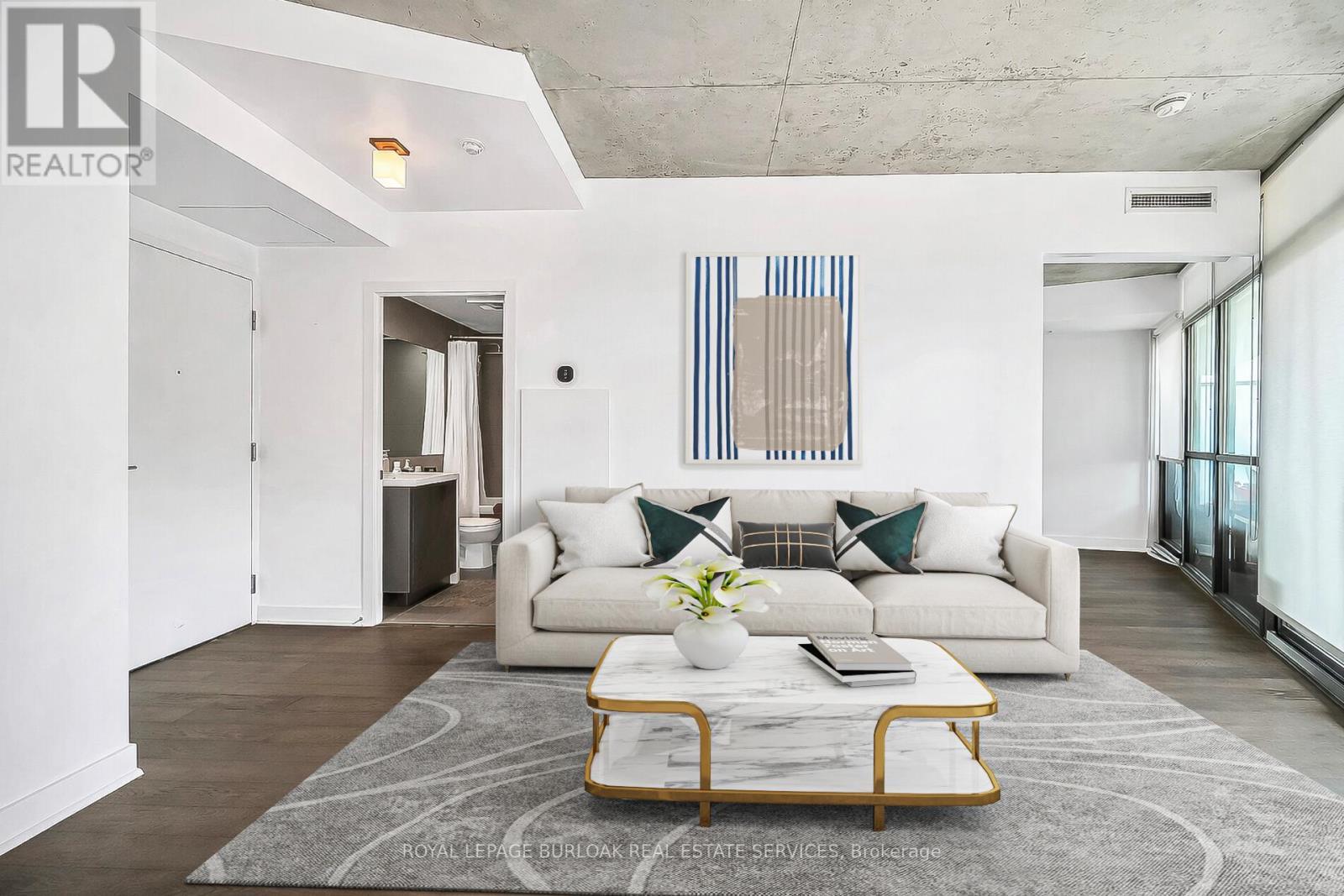 902 - 1201 Dundas Street E, Toronto, ON - Indoor Photo Showing Living Room