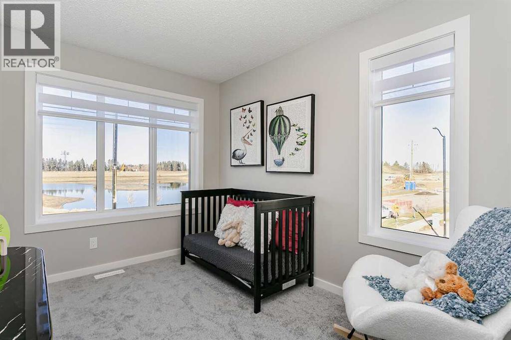 226 Heartwood Parade Se, Calgary, AB - Indoor Photo Showing Bedroom