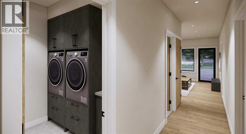 219B Three Sisters Drive, Canmore, AB - Indoor Photo Showing Laundry Room