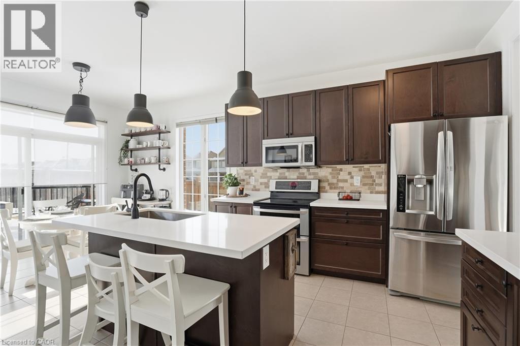 211 Odonnel Drive, Binbrook, ON - Indoor Photo Showing Kitchen With Upgraded Kitchen
