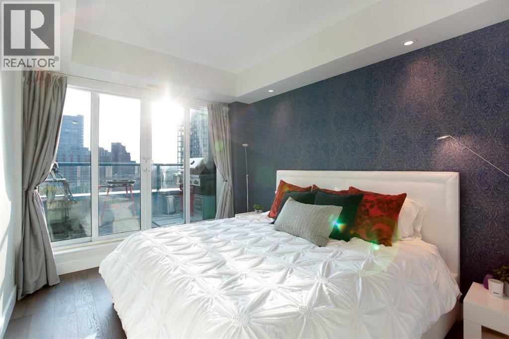 1005, 205 Riverfront Avenue Sw, Calgary, AB - Indoor Photo Showing Bedroom