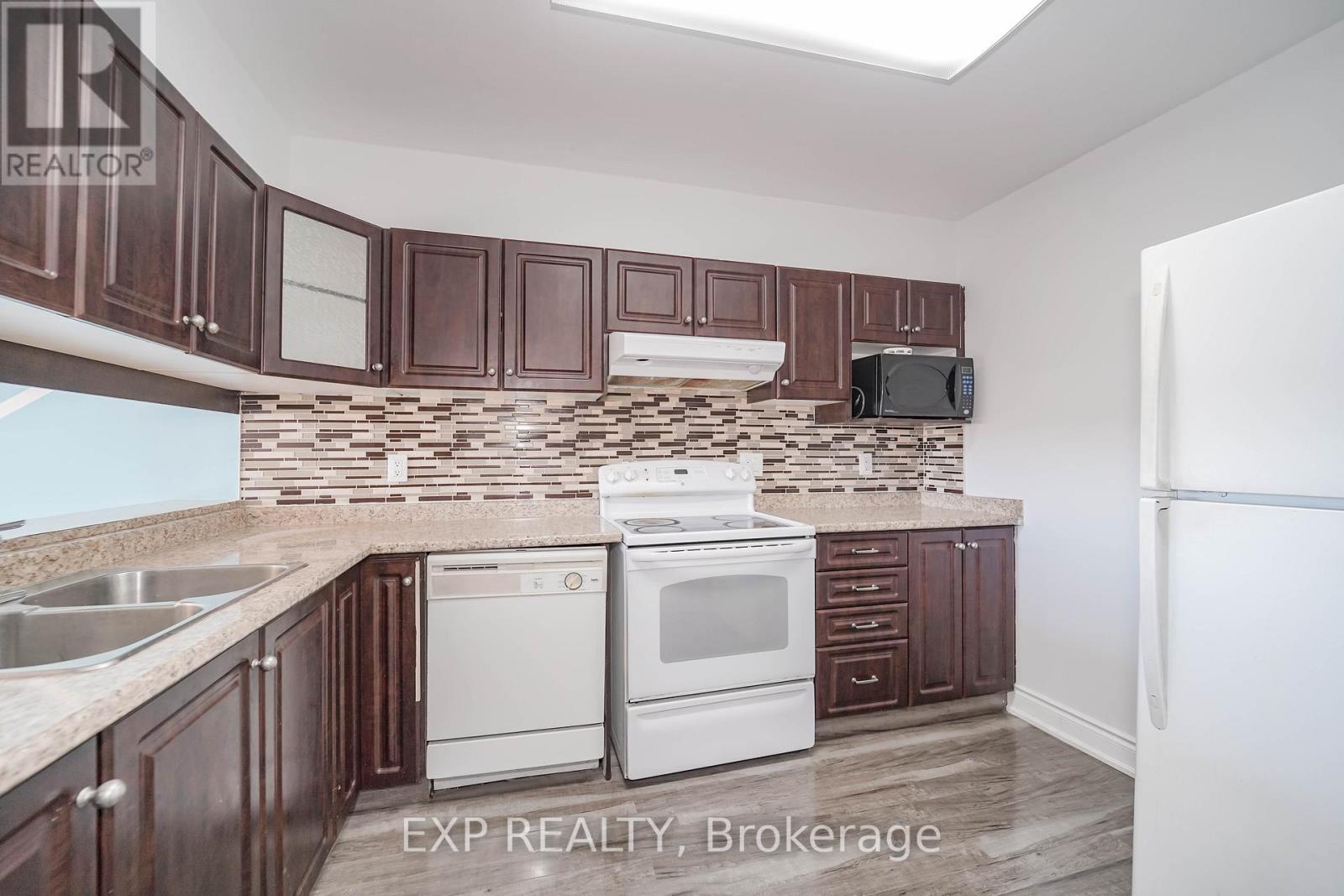 901 - 236 Albion Road, Toronto, ON - Indoor Photo Showing Kitchen With Double Sink