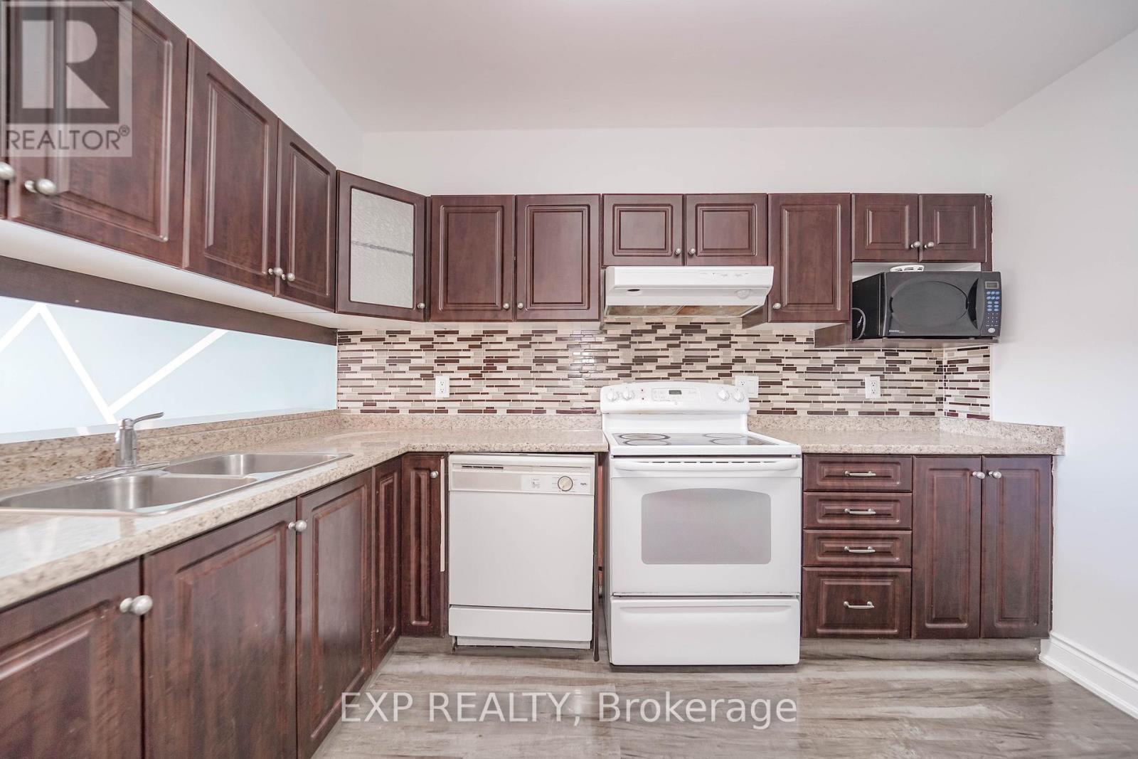 901 - 236 Albion Road, Toronto, ON - Indoor Photo Showing Kitchen With Double Sink