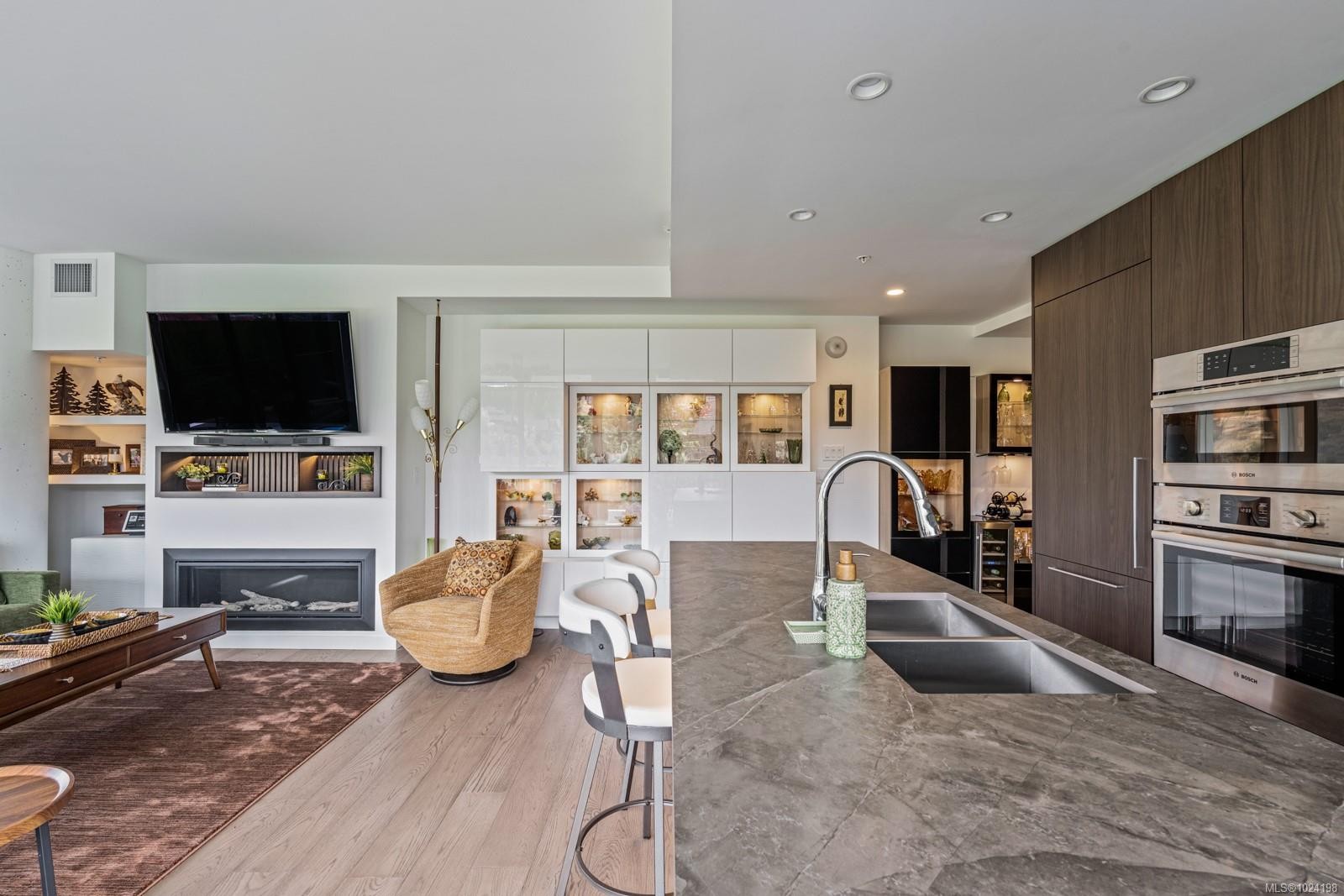 815-2000 Hannington Rd, Langford, BC - Indoor Photo Showing Kitchen With Fireplace With Double Sink With Upgraded Kitchen