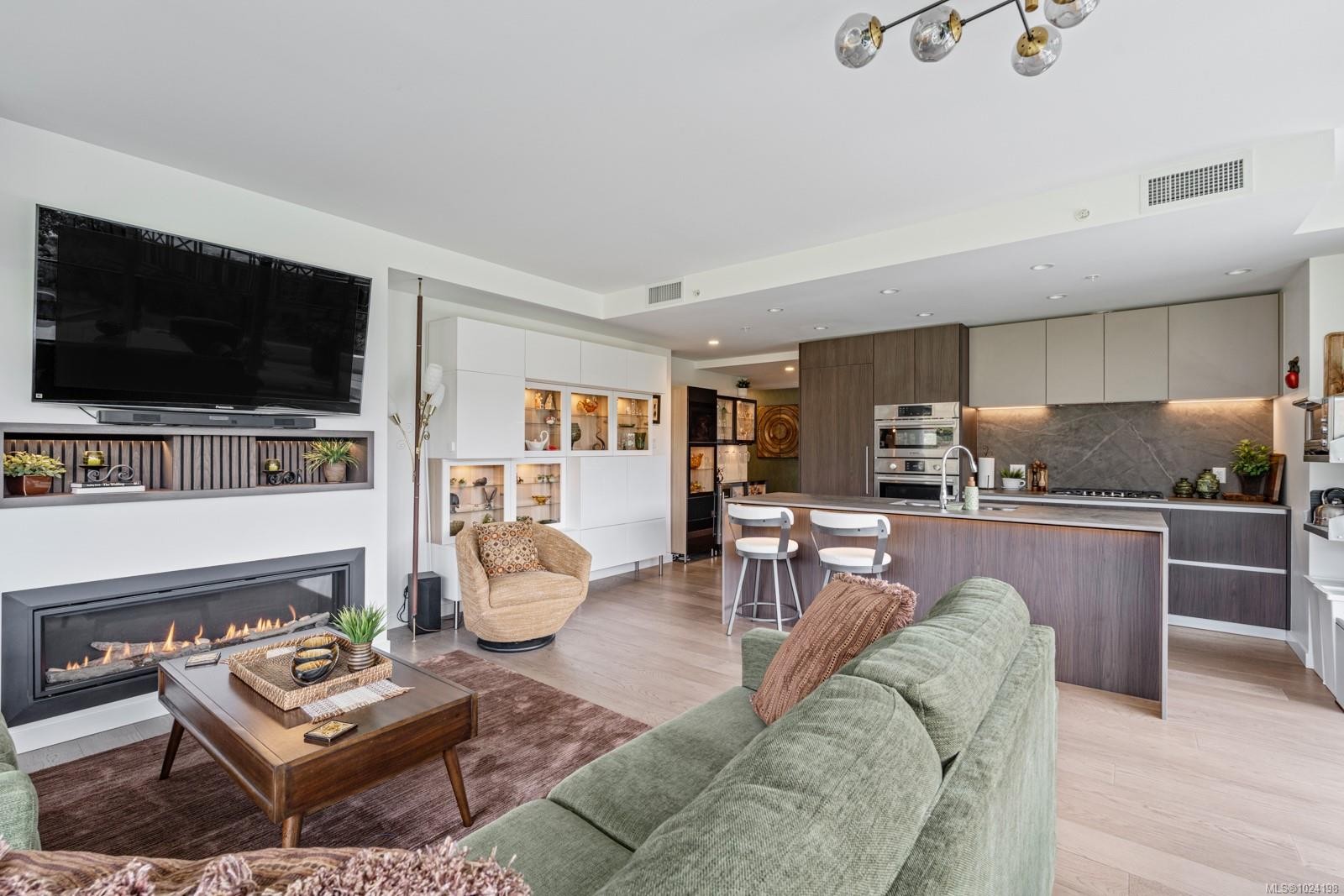 815-2000 Hannington Rd, Langford, BC - Indoor Photo Showing Living Room With Fireplace