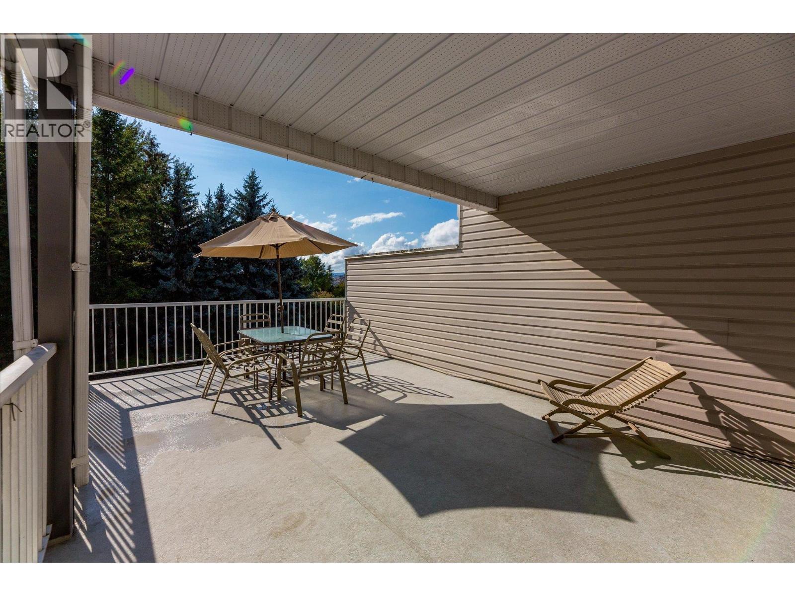 This is a corner unit with lots of privacy overlooking neighbouring forest - 4404 Pleasant Valley Road Unit# 6, Vernon, BC - Outdoor With Exterior