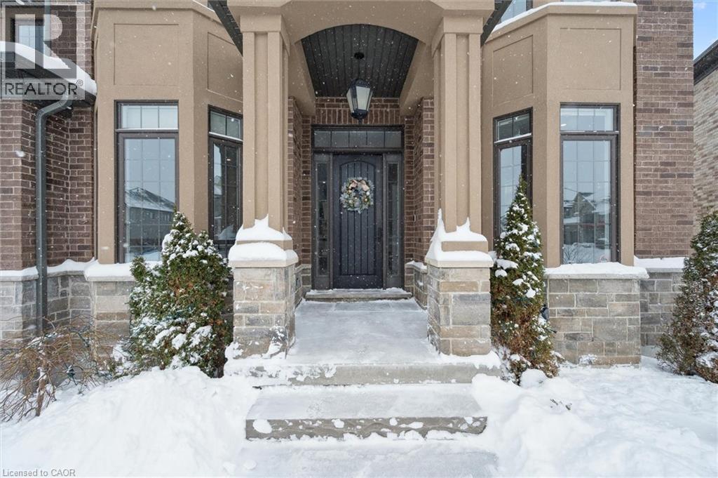 Doorway to property with brick siding - 263 Chestnut Ridge, Waterloo, ON - Outdoor With Facade