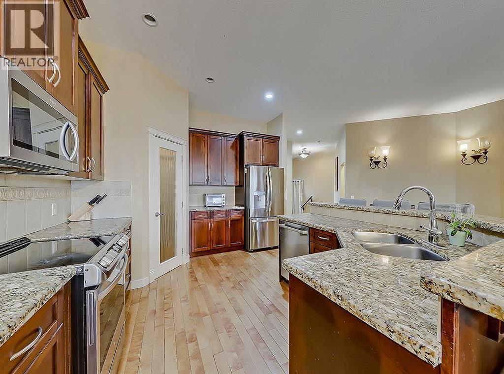 308 Lineham Acres Drive Nw, High River, AB - Indoor Photo Showing Kitchen With Double Sink With Upgraded Kitchen