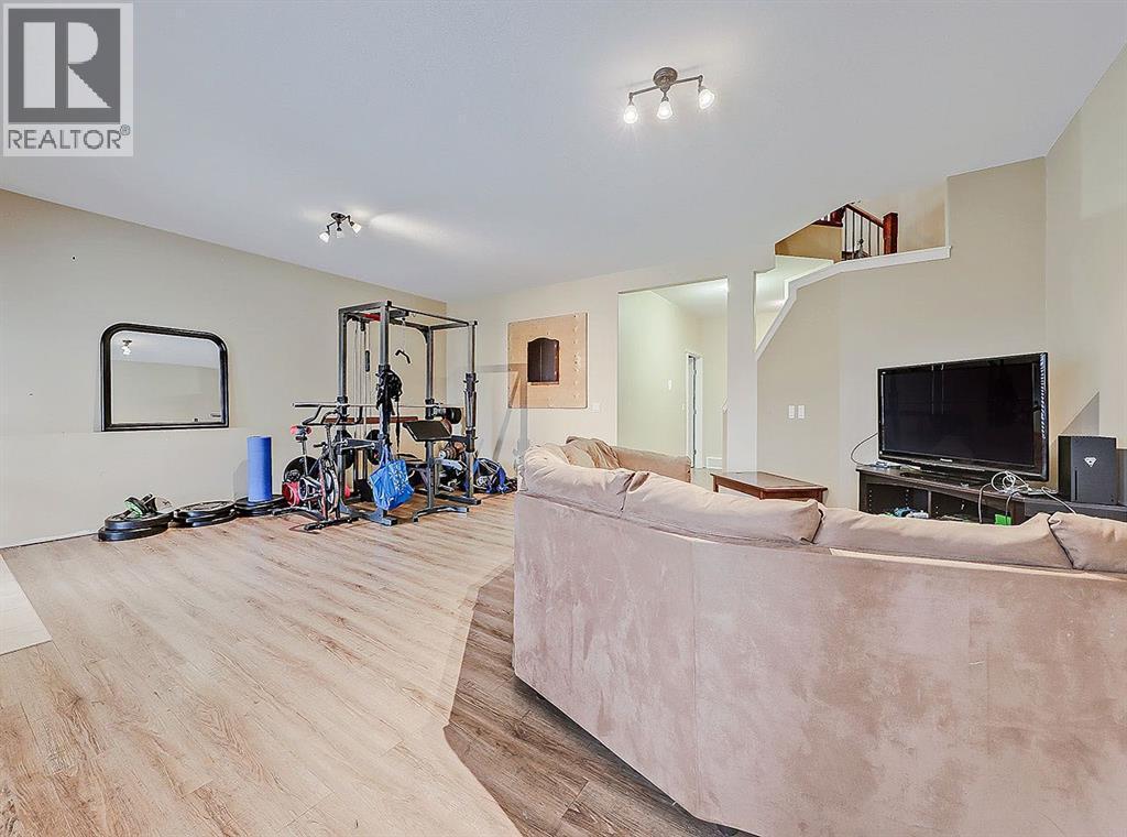 308 Lineham Acres Drive Nw, High River, AB - Indoor Photo Showing Gym Room