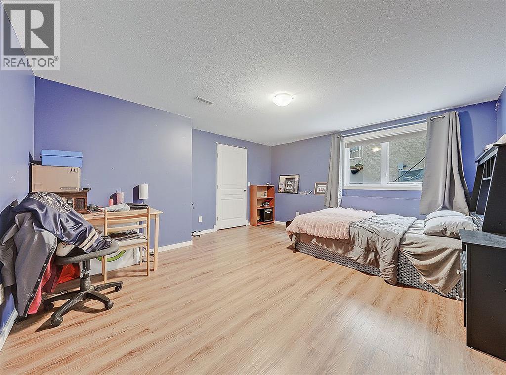 308 Lineham Acres Drive Nw, High River, AB - Indoor Photo Showing Bedroom