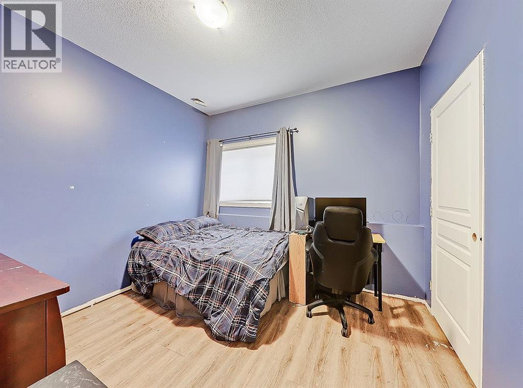 308 Lineham Acres Drive Nw, High River, AB - Indoor Photo Showing Bedroom