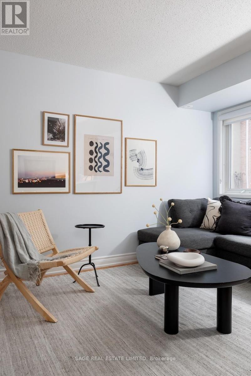 144 - 30 Merchant Lane, Toronto, ON - Indoor Photo Showing Living Room