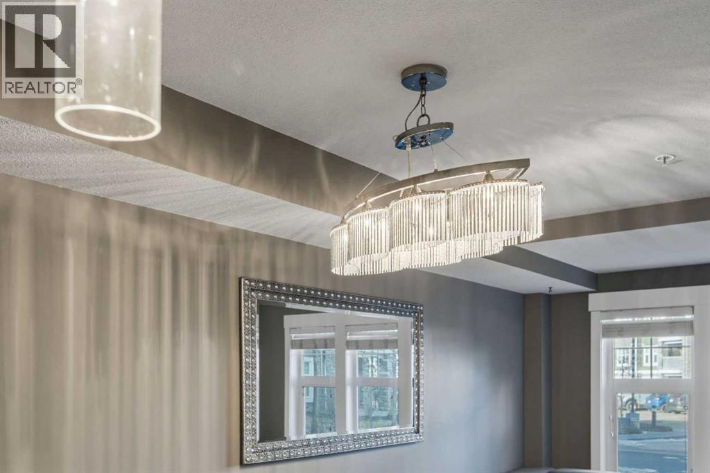 light fixtures above dining space - 2118, 11 Mahogany Row Se, Calgary, AB - Indoor Photo Showing Other Room