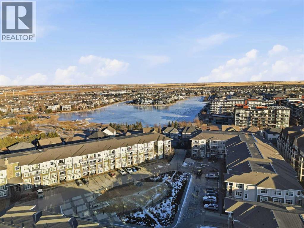 Walking distance to Mahogany Lake - 2118, 11 Mahogany Row Se, Calgary, AB - Outdoor With Body Of Water With View