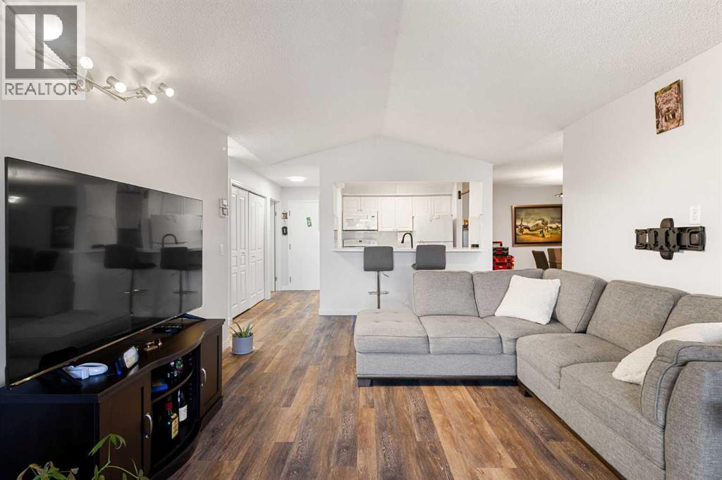 510, 55 Arbour Grove Close Nw, Calgary, AB - Indoor Photo Showing Living Room