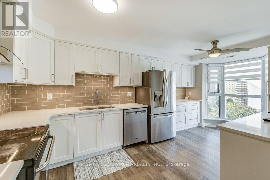 9D - 67 Caroline Street S, Hamilton, ON - Indoor Photo Showing Kitchen With Stainless Steel Kitchen With Double Sink