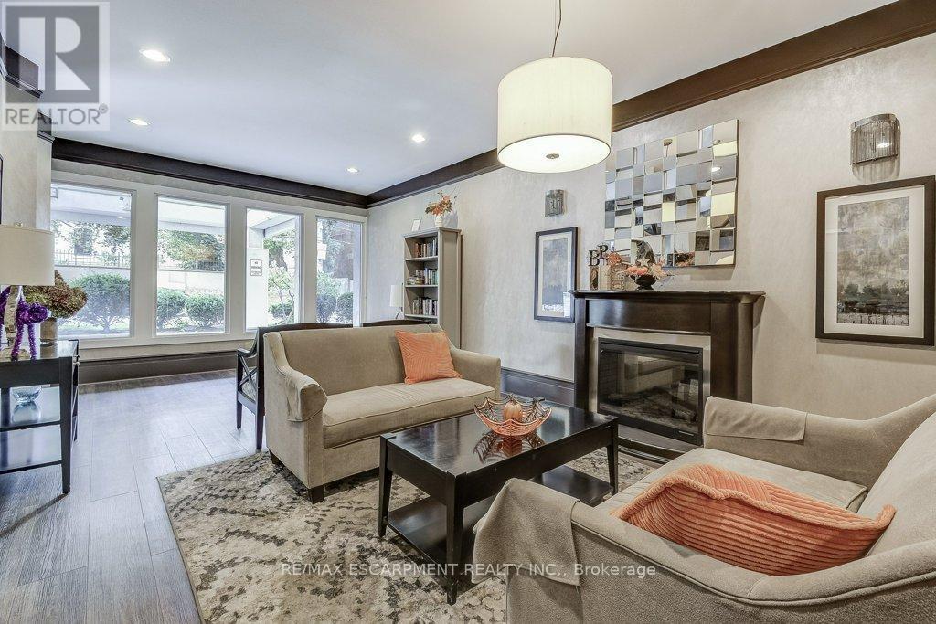 9D - 67 Caroline Street S, Hamilton, ON - Indoor Photo Showing Living Room With Fireplace