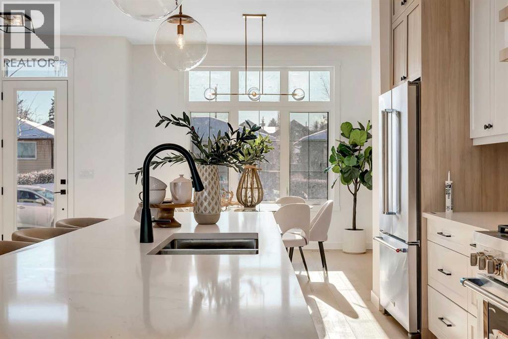 2436 30 Avenue Sw, Calgary, AB - Indoor Photo Showing Kitchen With Double Sink With Upgraded Kitchen