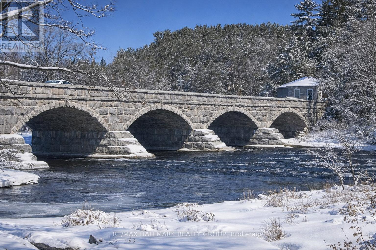 5 span stone bridge with building at the base - 4883 Kinburn Side Road, Mississippi Mills, ON