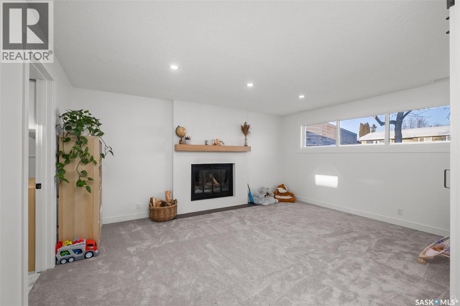 3103 Grey Owl Crescent, Prince Albert, SK - Indoor Photo Showing Living Room With Fireplace
