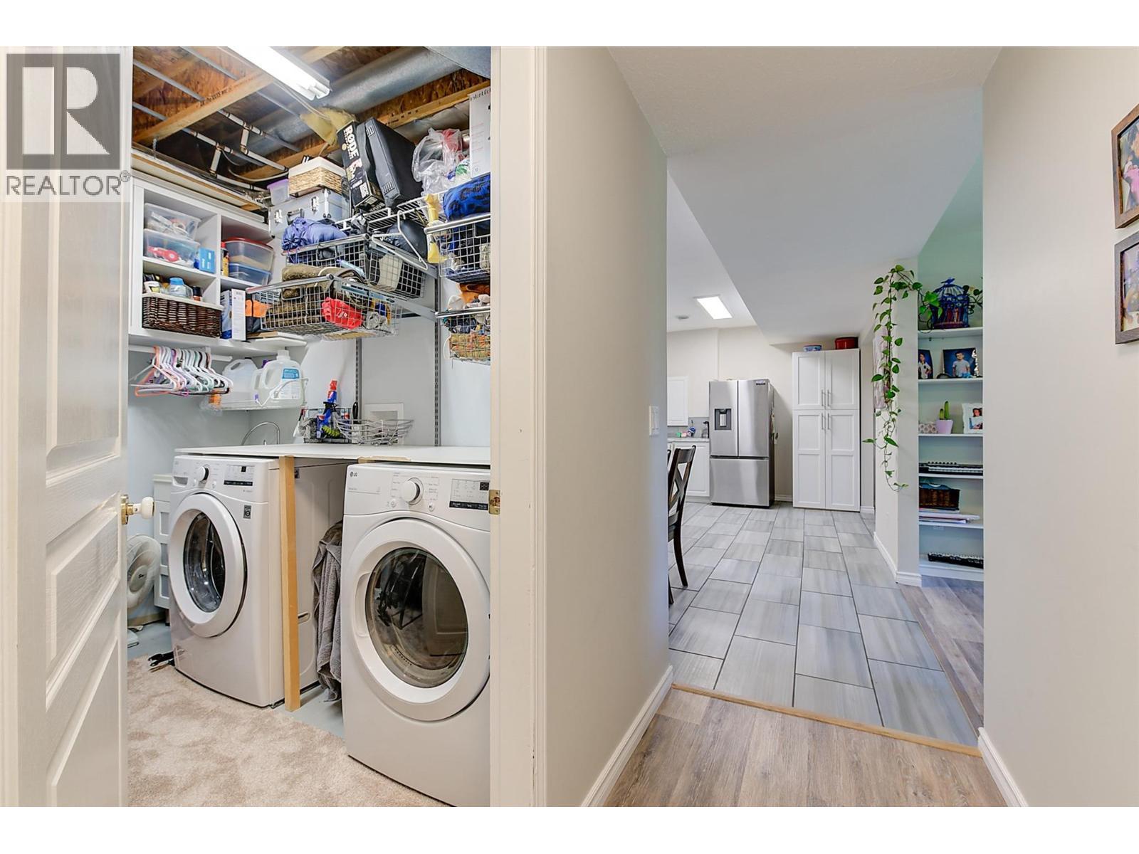 Separate Laundry in 2 bedroom suite. - 1420 Bentien Road, Kelowna, BC - Indoor Photo Showing Laundry Room