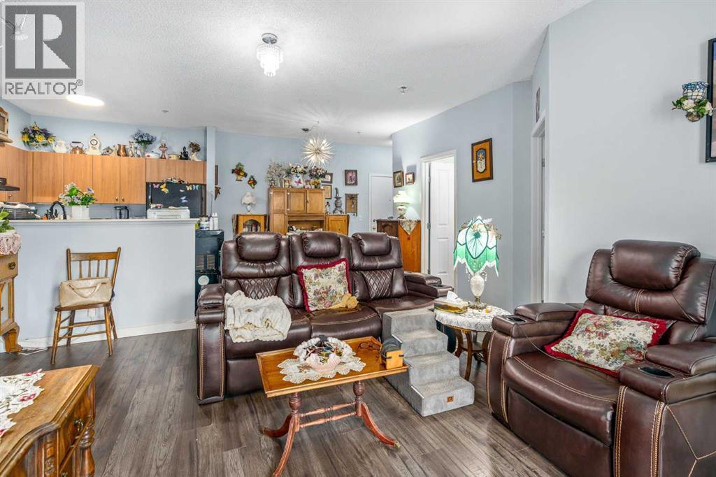 1116, 1140 Taradale Drive Ne, Calgary, AB - Indoor Photo Showing Living Room