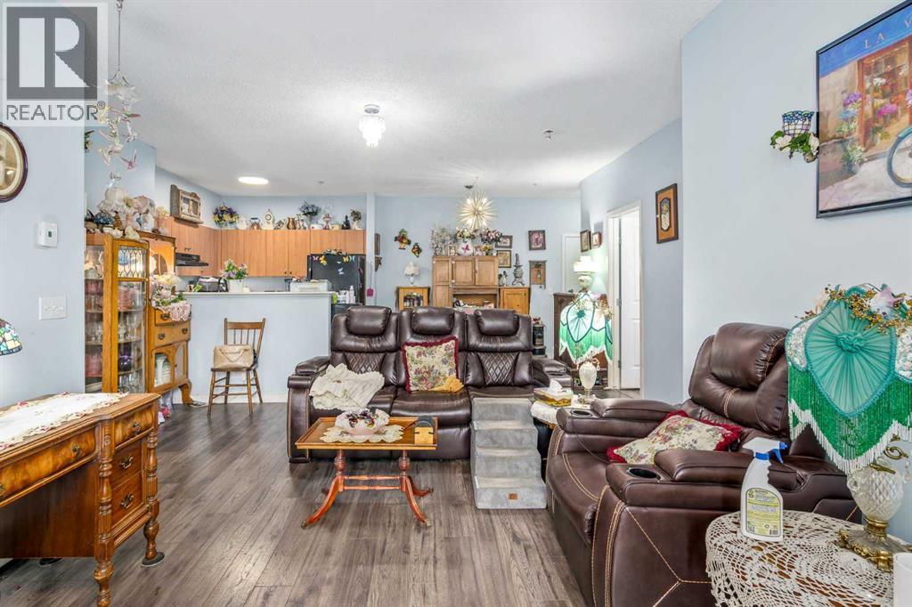 1116, 1140 Taradale Drive Ne, Calgary, AB - Indoor Photo Showing Living Room