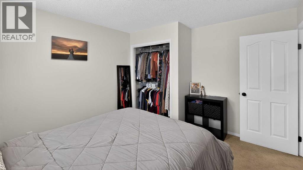 5813 50 Street, Taber, AB - Indoor Photo Showing Bedroom