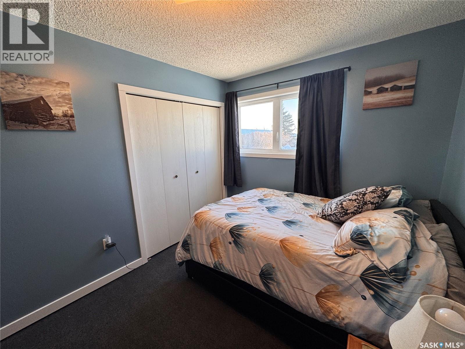 415 3Rd Avenue W, Biggar, SK - Indoor Photo Showing Bedroom