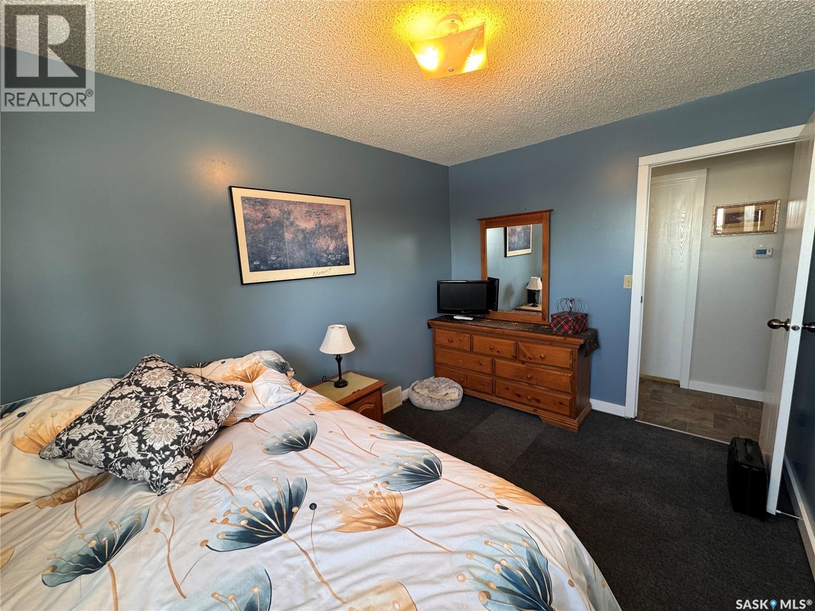415 3Rd Avenue W, Biggar, SK - Indoor Photo Showing Bedroom