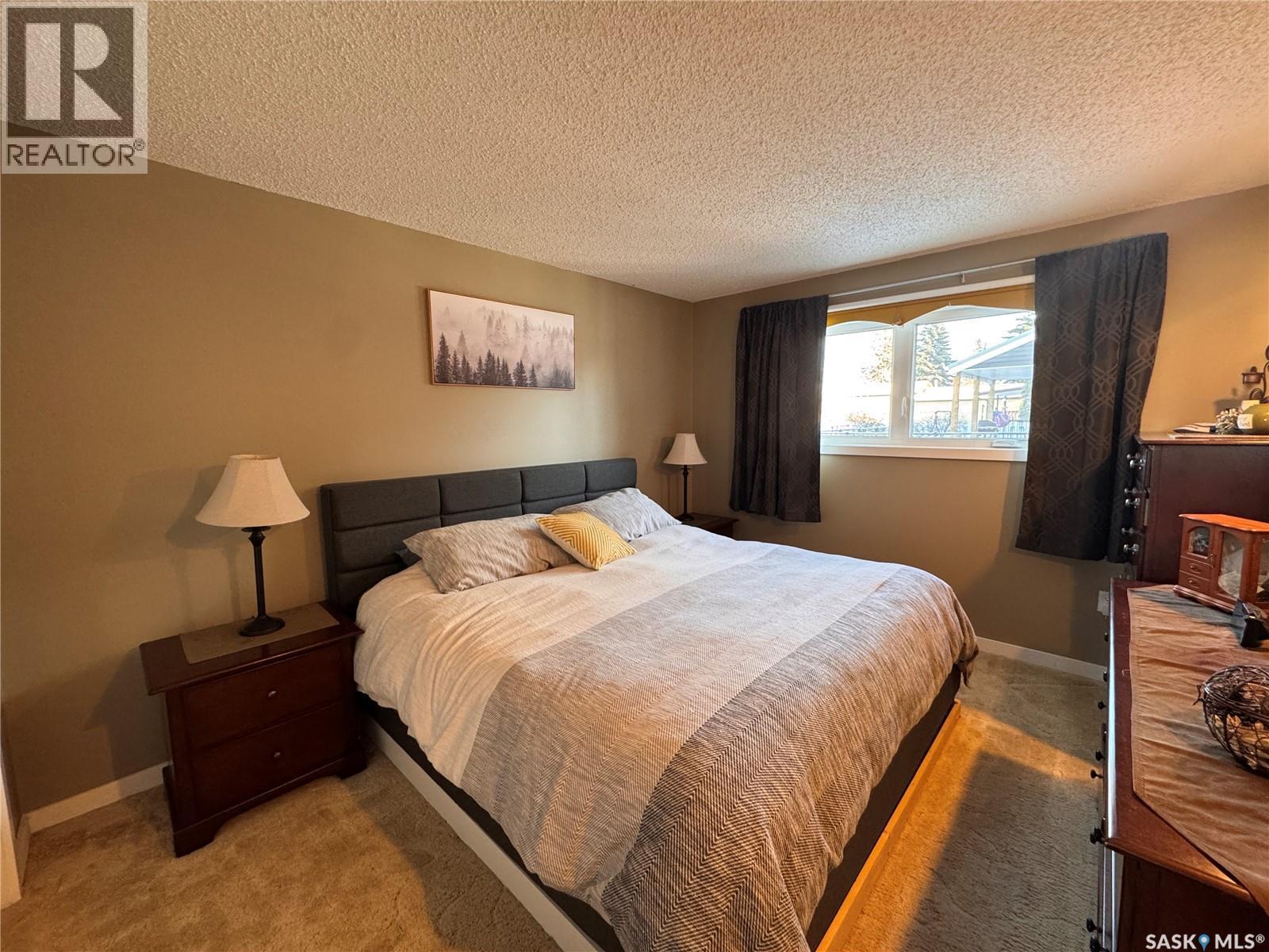 415 3Rd Avenue W, Biggar, SK - Indoor Photo Showing Bedroom