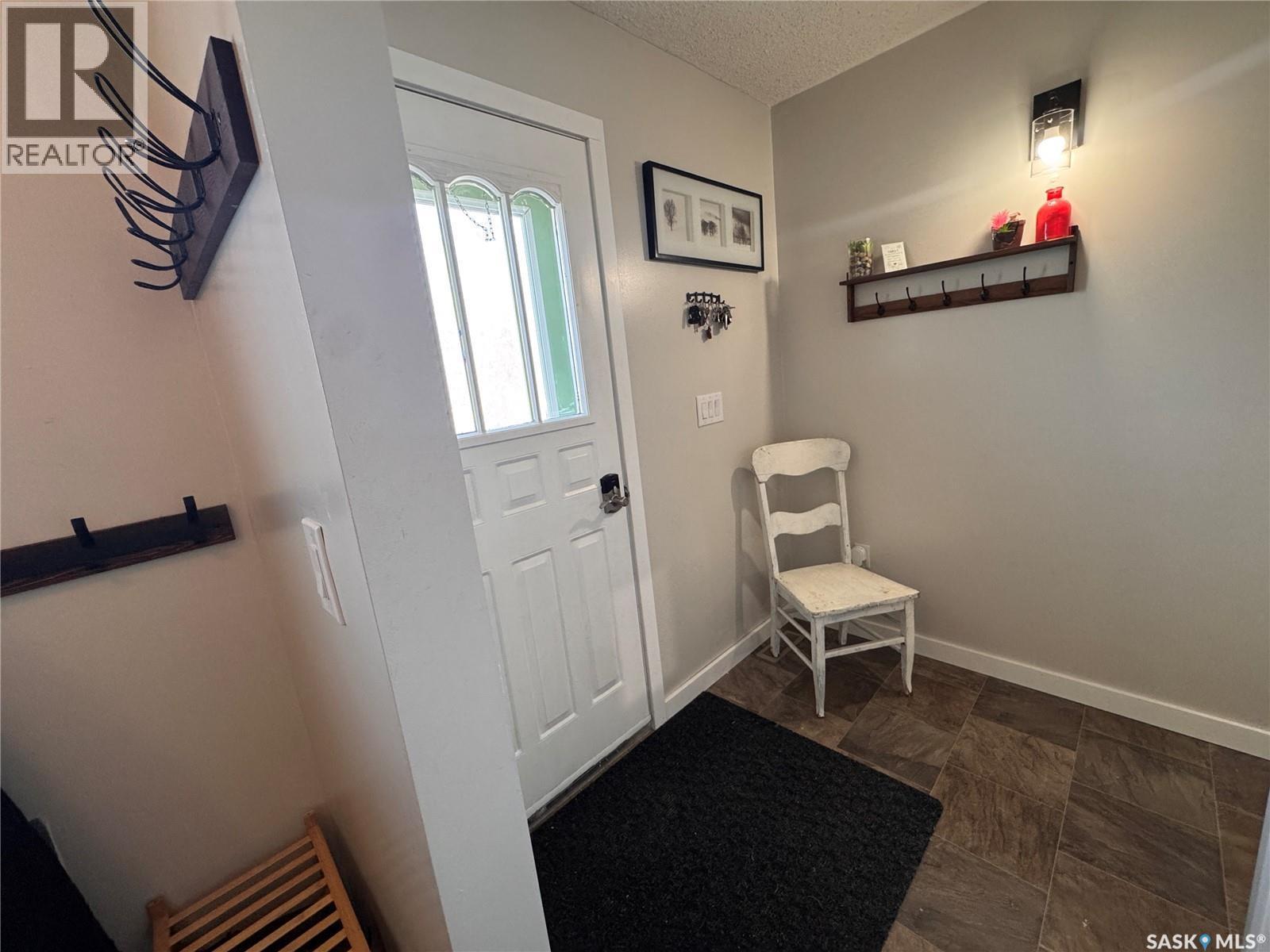 415 3Rd Avenue W, Biggar, SK - Indoor Photo Showing Other Room