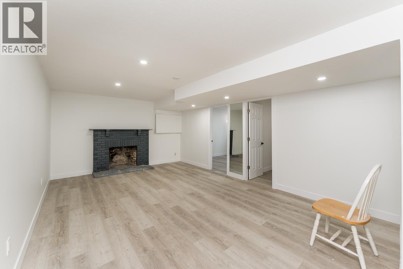 7790 Queens Crescent, Prince George, BC - Indoor With Fireplace